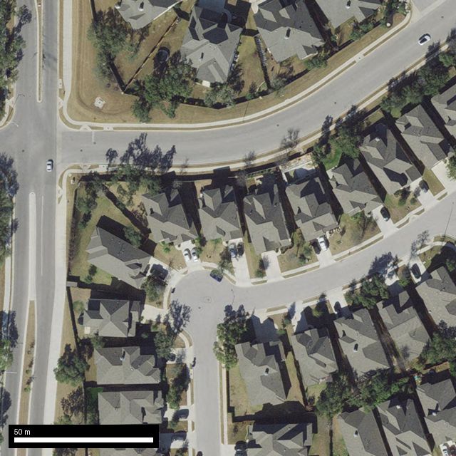 Aerial photograph of a residential street in Cedar Park, Texas.